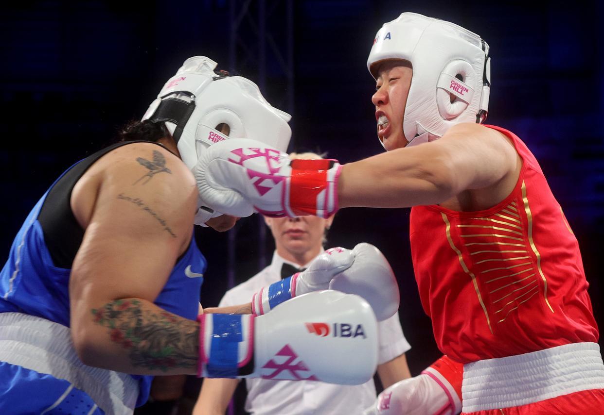 开云APP-女子拳击冠军成功卫冕，气势如虹